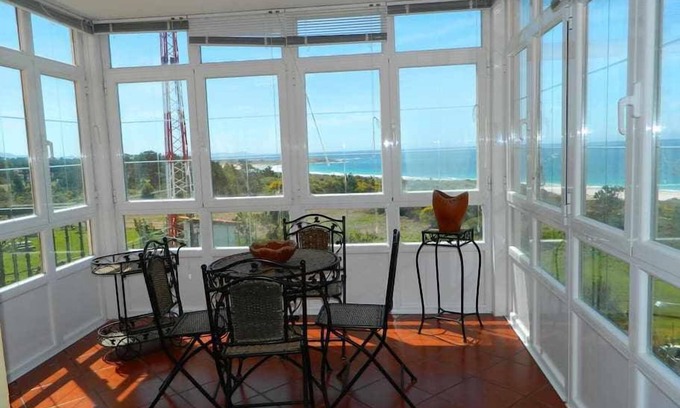 Larino Apartment | Front line beach apartment in Lariño