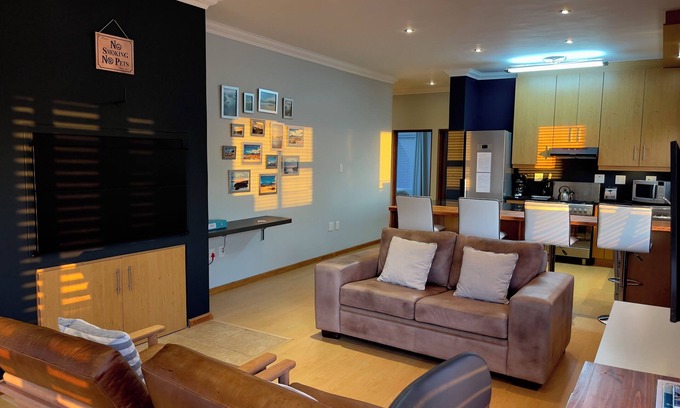 De Kelders Apartment | Fully equipped self-catering apartment steps away from ocean.