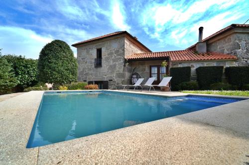 Quintans House | GALIHOST - Casa con piscina próxima a Sanxenxo