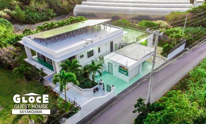 Miyakojima Apartment | GLOCE PORT SIDE HOUSE l 砂山ビーチ近くのオーシャンビューバルコニーハウスを貸切 長期滞在向け BBQ可