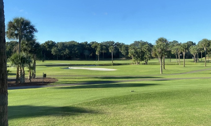 Oak Grove Condo | Golf views on 4th tee box. Close drive to beach. Clean linens provided for fee.