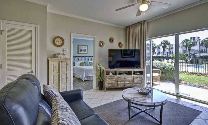 Frangista Beach Condo | Gorgeous 2 BDRM condo steps to private beach! Walk right out patio to pool