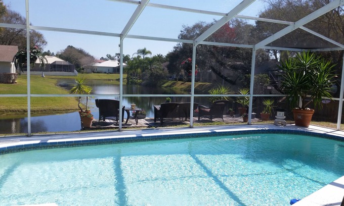 East Lake House | GORGEOUS Lakefront Pool Home with 2 Hole Putting Green, Sleeps 10 RESORT STYLE