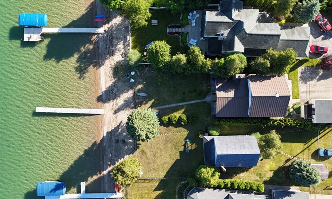 Beulah House | Gorgeous Sunsets at Crystal Lake Waterfront Home