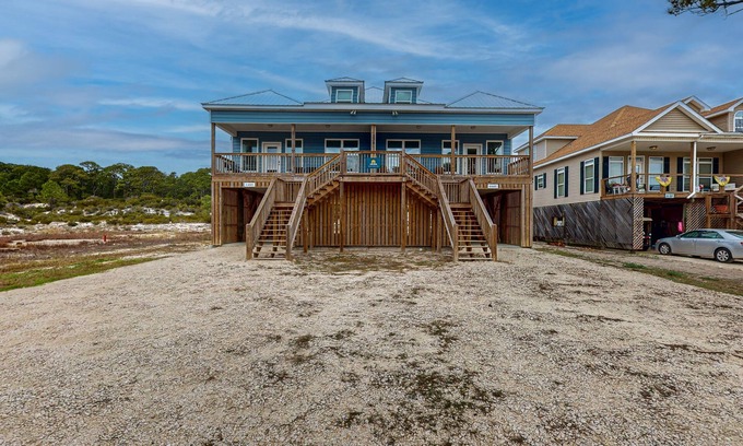 Audubon Place House | Gulfview duplex with panoramic views, large balcony, and internet