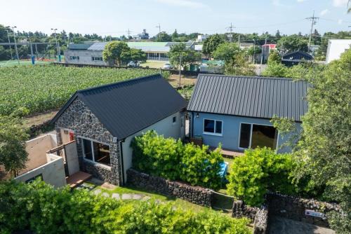 Andeok House | Gwarangpelong Minbak Jeju Couple Family Private House
