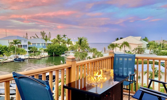 Holmes Beach House | Heated pool & spa, Bay views from 3 stories, 5-min walk to beach, Elevator