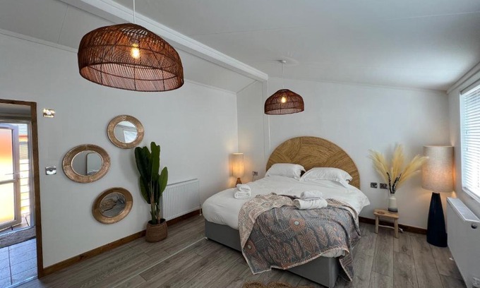 Storwood House | Hedgehog Lodge at Owlet Hideaway - with Hot Tub, near York