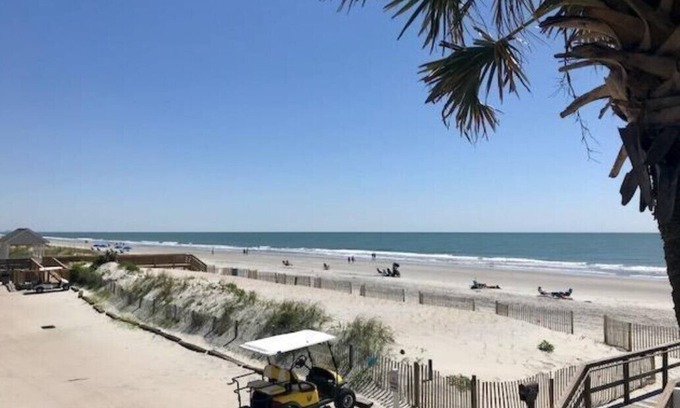 Garden City House | Here Comes The Sun Beach House. Walk to Beach. Golf Cart. on Canal. Linens. WiFi