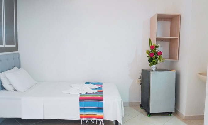 Covenas Hotel | Hermosa Habitación Básica Cuádruple A Pie De Playa