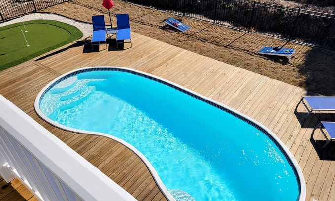 Holden Beach House | Holden Our Flip Flops heated pool, putting green and short walk to beach
