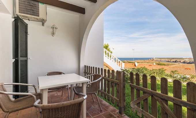 Arenal d'en Castell Apartment | Holiday Apartment “Apartamento en Arenal Castell” with Wi-Fi, A/C, Pool, Terrace & Garden