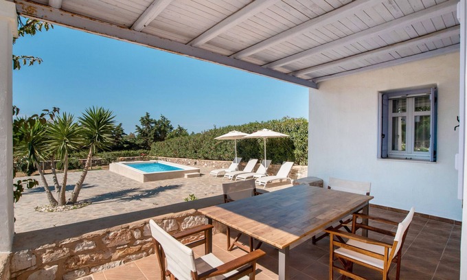 Chrissi Akti House | Holiday Home 'Blue Xenia' with Sea View, Wi-Fi and Air Conditioning