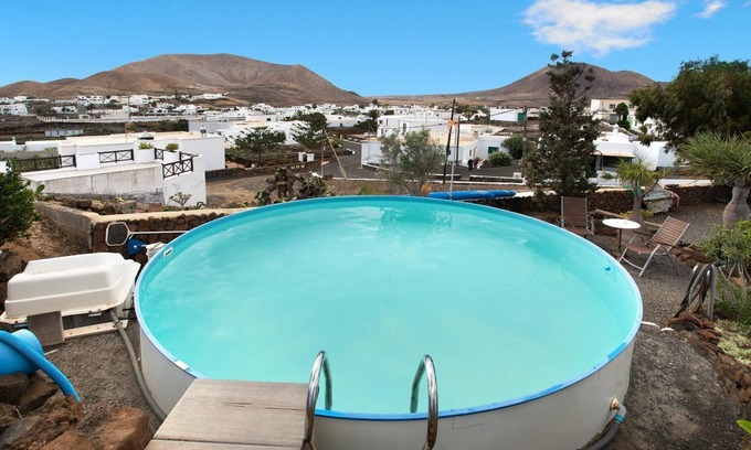 Guatiza House | Holiday Home Casa Caldereta with Mountain View, Pool, Wi-Fi & Terrace