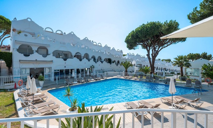 Urbanizacion Hacienda las Chapas House | Holiday Home 'Latifa' with Shared Pool, Wi-Fi and Air Conditioning