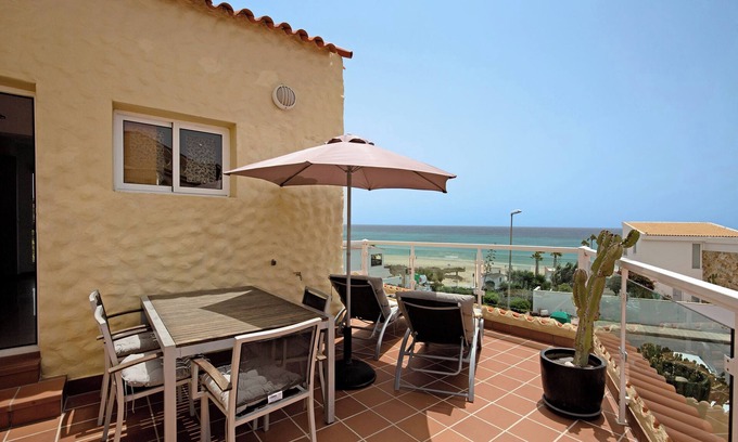 Bahia Calma Apartment | Holiday Home 'Relax & Comfort on Costa Calma' with Sea View, Shared Pool and Wi-Fi