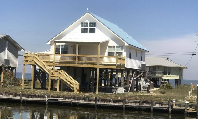 Silver Cay House | Home on water w/boat dock. 3 bed, 3 bath. Sleeps 9. Sunsets, beaches, fishing.