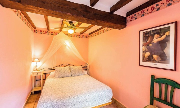 Robledillo de Gata Apartment | Homerez - Apartment garden view - Robledillo de Gata.