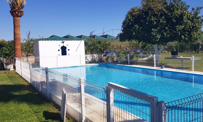 Utrera Ski Chalet | Homerez - Chalet for 14 ppl. with swimming-pool, garden and terrace at Utrera