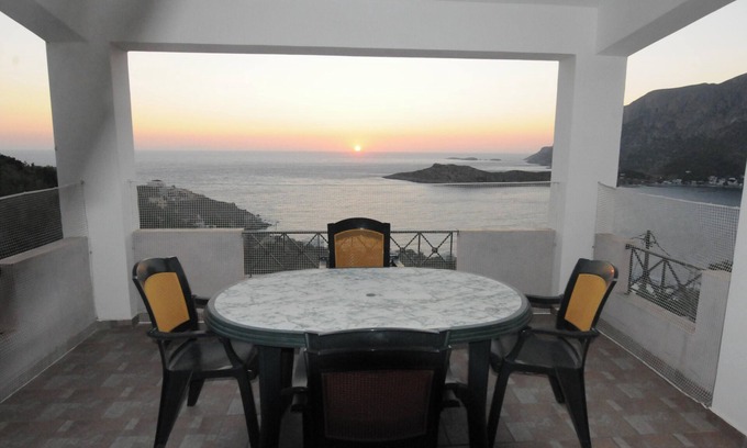 Kamari House | Homerez - Comfortable house in Mirties with terrace and parking