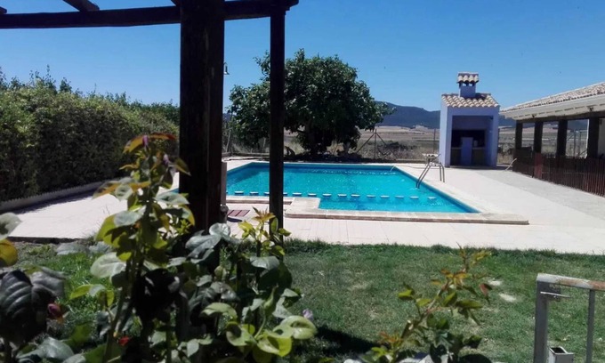Caravaca de la Cruz House | Homerez - House with Jacuzzi and Mountain Views in Noguericas