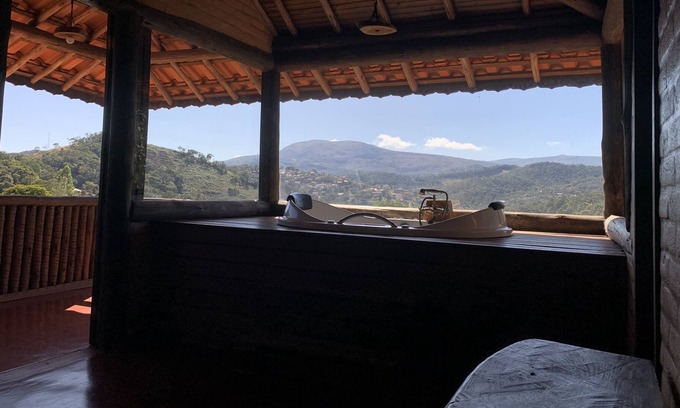 Conceicao do Ibitipoca Ski Chalet | Hot tub and a unique view of the Arraial and the Park within the Alto da Colina Reserve