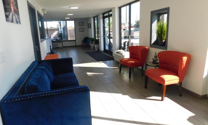 Pines Village Hotel | Hotel 10 Extended Stay