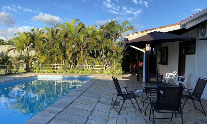 Cananeia House | House in Cananéia with swimming pool and barbecue area