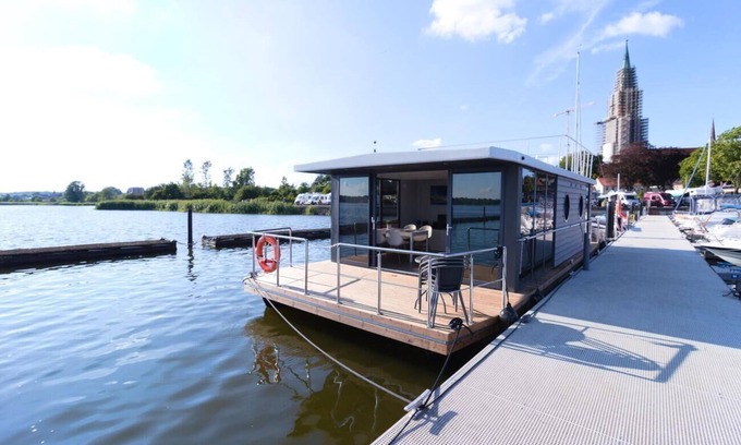 Schleswig Boat Rental | Houseboat Fjord Aries with roof terrace in Schleswig