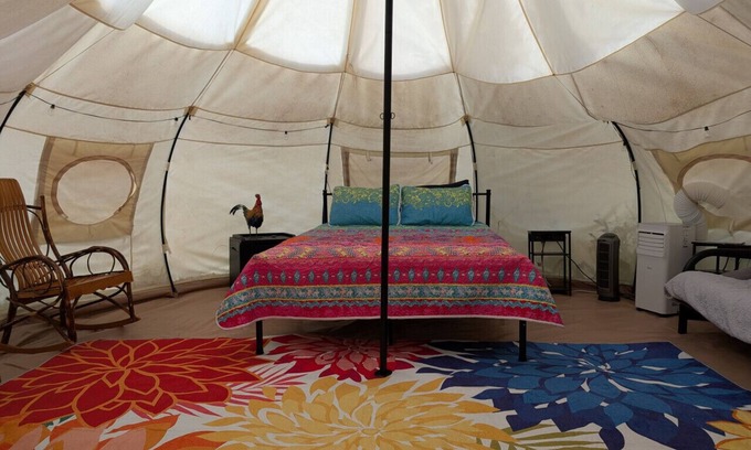 Kasbeer RV Rental | Huge Heated Tent w/King Bed on 175 Acre Farm