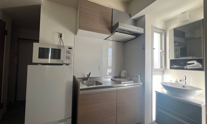 Shikina Apartment | Ideal for travel, a clean studio with excellent access.