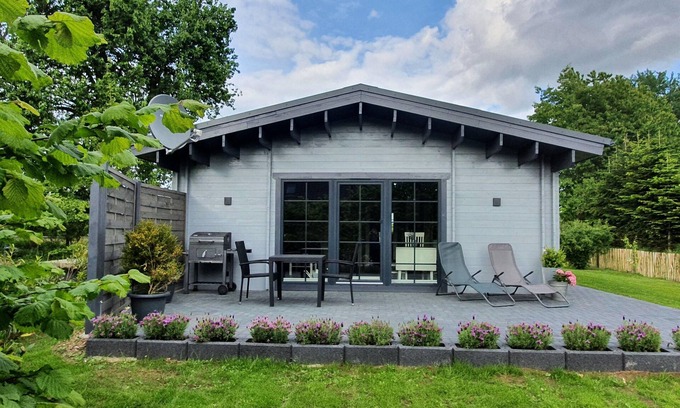 Martensrade House | Idyllisches Blockbohlenhaus mit eigenem Garten und Sauna zum Wohlfühlen