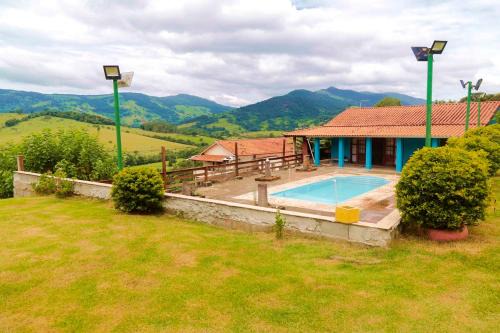 Extrema House | Incrivel chacara com pisc e churrasq em Extrema MG