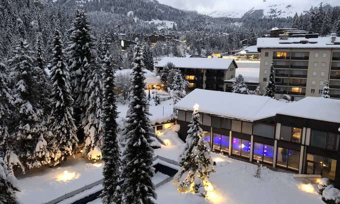 Laax Apartment | Indoor pool, sauna, outdoor pool, tennis court, covered parking lot, fitness room