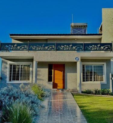 Comuna Estancia Vieja House | Jacarandá