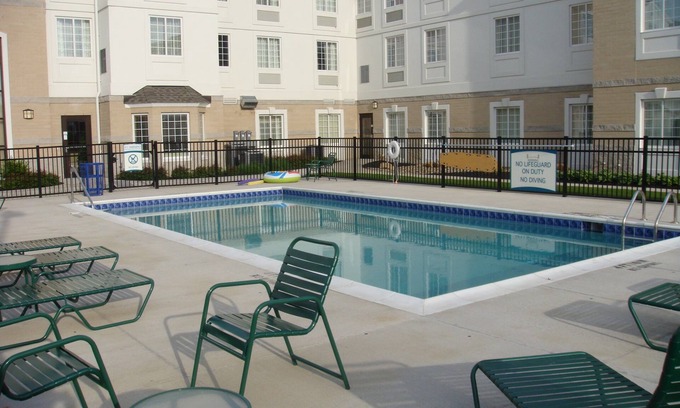 Mayfield Heights Condo | King Suite | 24-Hour Business Center, Fitness Center + Free Daily Breakfast