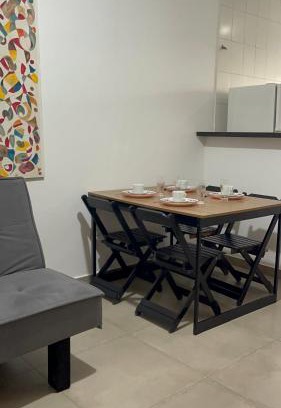 Jardim Virginia Apartment | Kit net completa na Praia da Enseada
