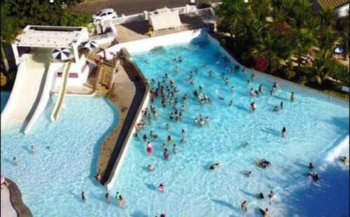 Jardim Paraiso Apartment | L'acqua Diroma - Suítes confortáveis - Diversão garantida - Piscina de Ondas Exclusiva