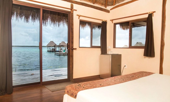 Mario Villanueva Madrid Cabin | Lagoon Front Suite with Bikes & Kayaks