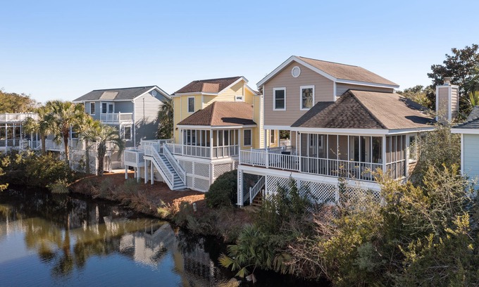 Pelican Bay House | Lagoon view, screen porch w/swing bed, Pool, near beach - 3 Pelican Bay