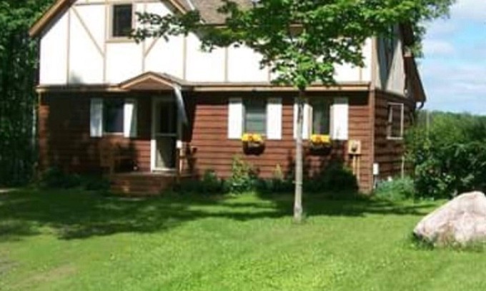 Audubon Cabin | Lake Front Big Yard Fishing Dock Paddle Boat AC Campfire Swimming Grill Deck