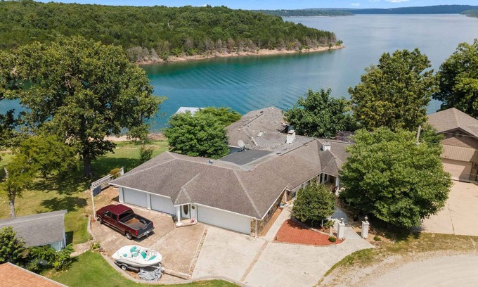 Protem House | Lake house with dock access right out back. Beautiful lake views. Great fishing.