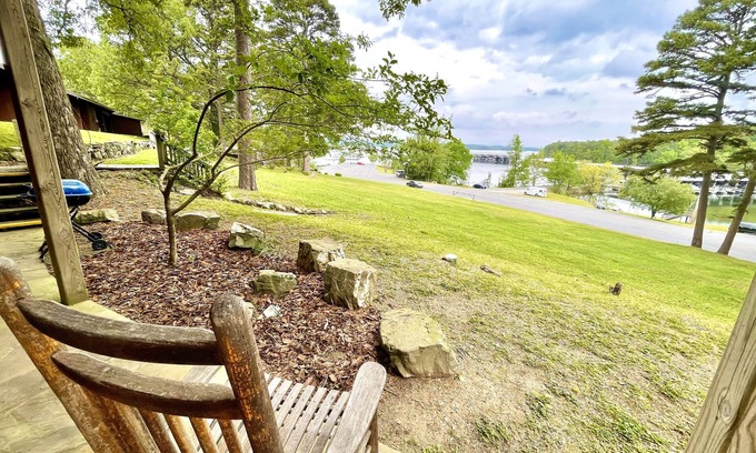 Mount Ida Apartment | Lake view queen Guest Room with two queens, sleeper sofa and deck overlooking Lake Ouachita. by RedAwning