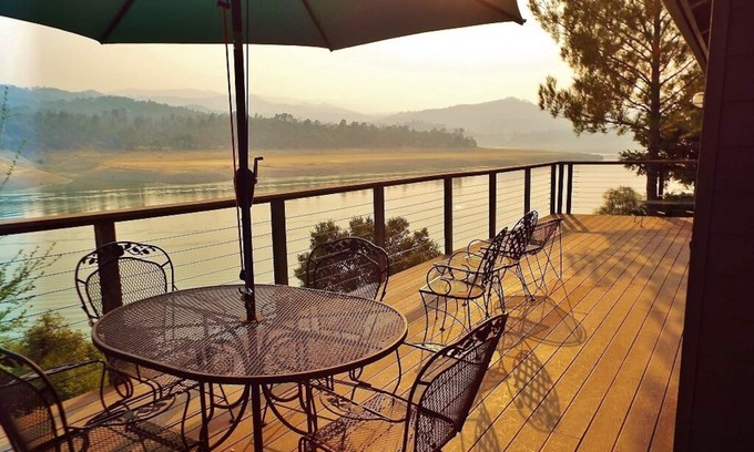 Oak Shores House | Lakefront Chateaux with Dock, Unique Rock Wall for Privacy, and Internet