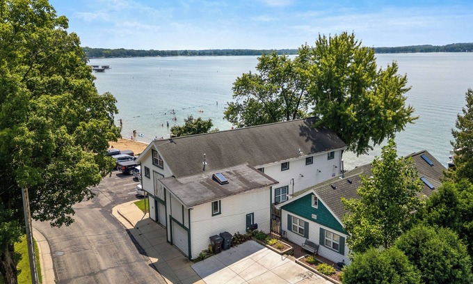 Lake Mills House | Lakefront Family Escape w~ Hot Tub ~Stunning Views nHouse and BoatHouse