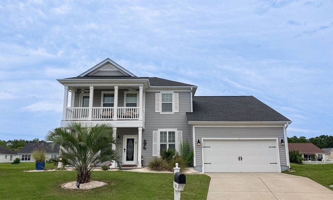 Forestbrook House | Lakefront home with enclosed yard, W/D, central AC & pool