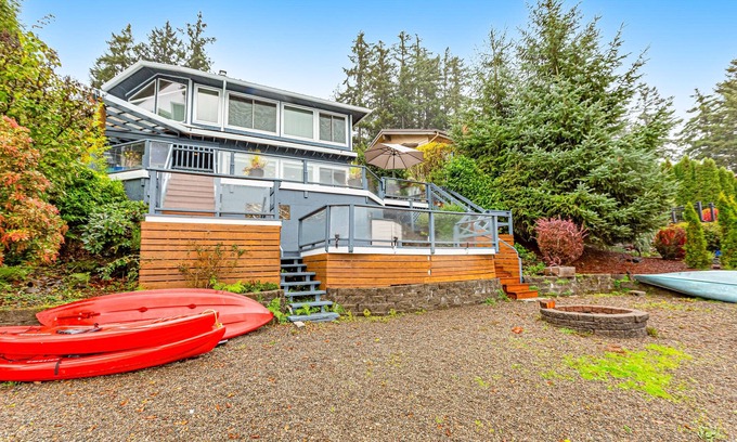 Olympia House | Lakefront home with canoe, kayaks, large deck, beach access, fireplace, & W/D