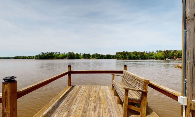 Prosperity House | Lakefront home with incredible sunset view, private dock, screened porch, and AC