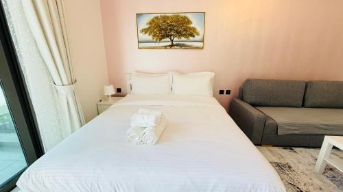International City Apartment | Lawnz Luxury furnished studio with Balcony Swimming Pool Gym Kids play ground