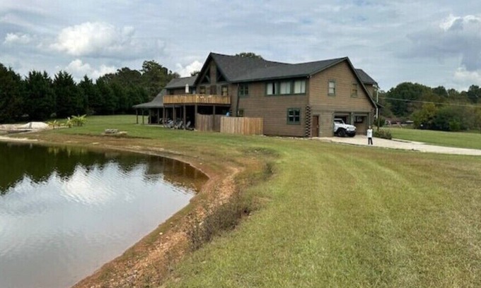 Bowdon Junction House | Log Castle and a Spring Fed Lake